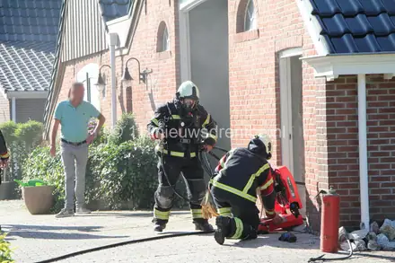 Brand bij woonboerderij in Emmer-Compascuum — foto 1 van 4