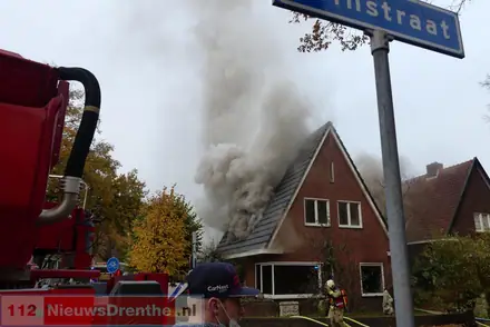 Brand in woning Emmen — foto 1 van 4